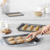 2-pack of non-stick silicone baking mats with cookie template for easy and reliable baking